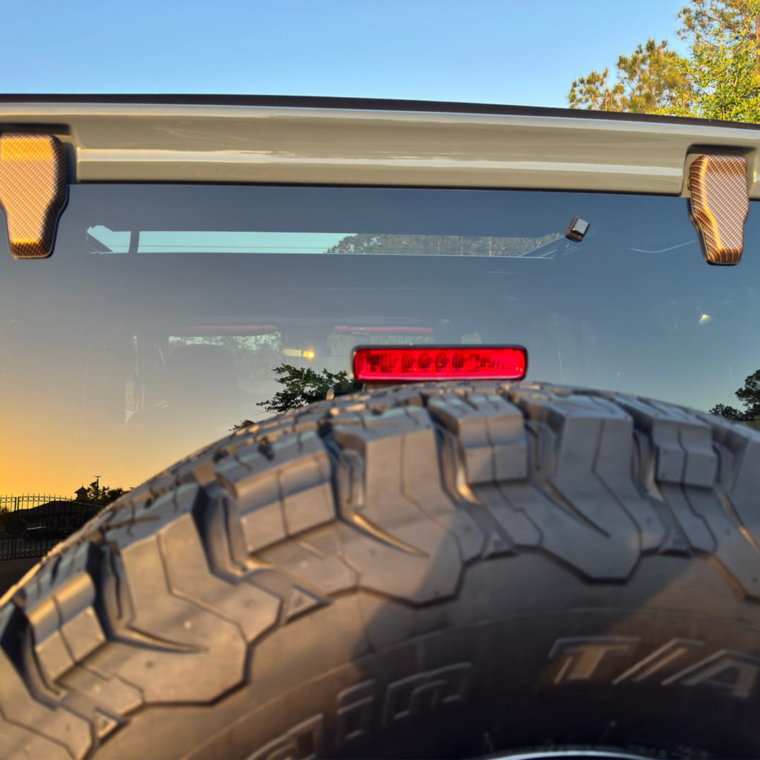 392 gold and black carbon graphic rear window hinge covers JL