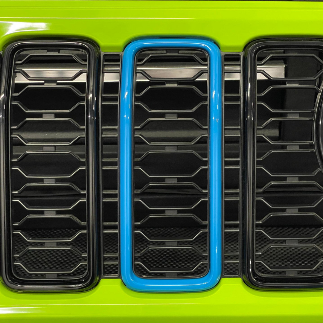 close-up of a 24' Mopar Grille trim slot in chief blue OEM Jeep color