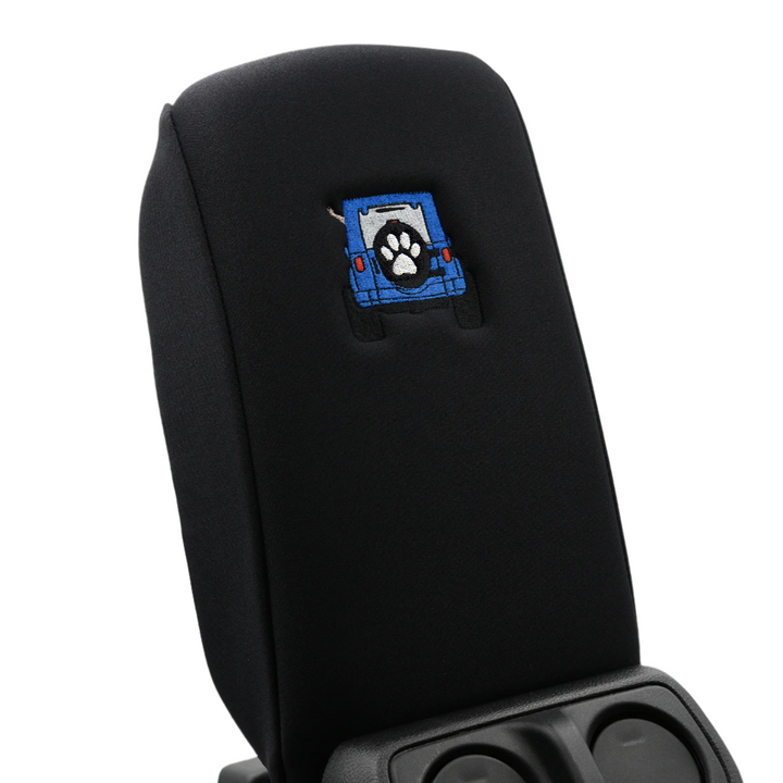 Black console cover with blue color-matched Jeep rear end and black tire cover with white paw print 