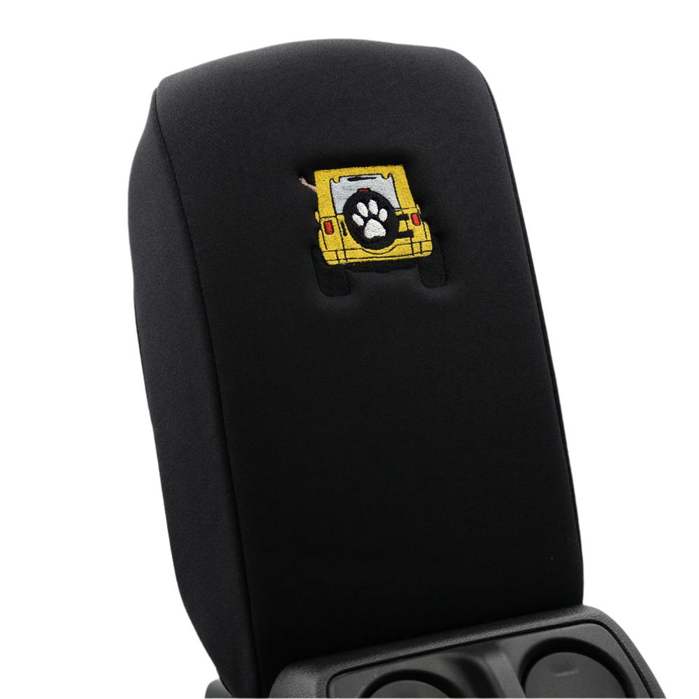 Black console cover with yellow color-matched Jeep rear end and black tire cover with white paw print 