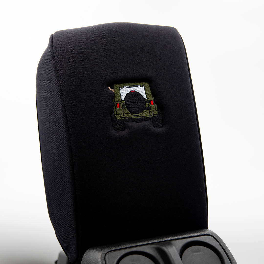 Black console cover with army green color-matched Jeep rear end and black tire cover