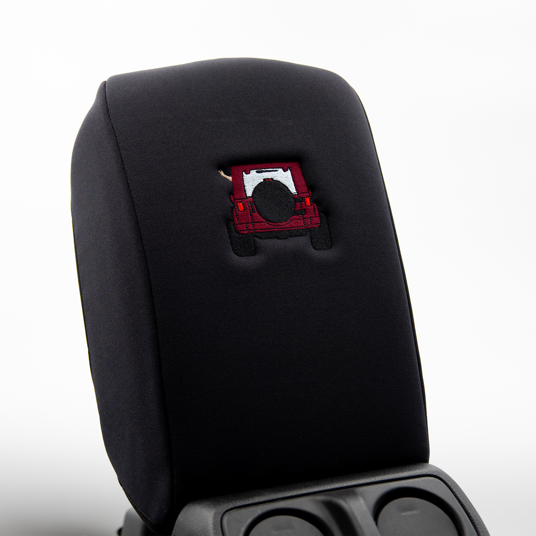 Black console cover with deep red color-matched Jeep rear end and black tire cover