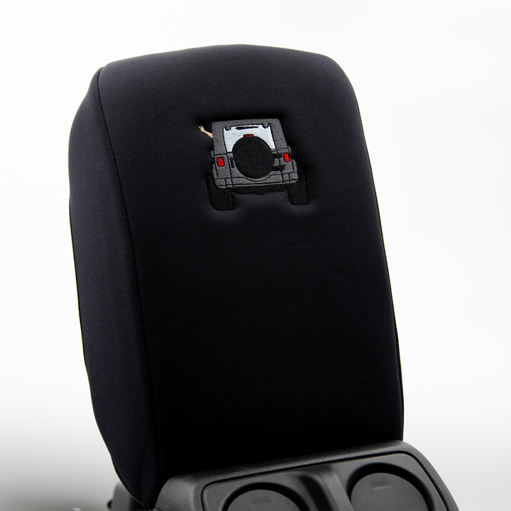 Black console cover with gray color-matched Jeep rear end and black tire cover