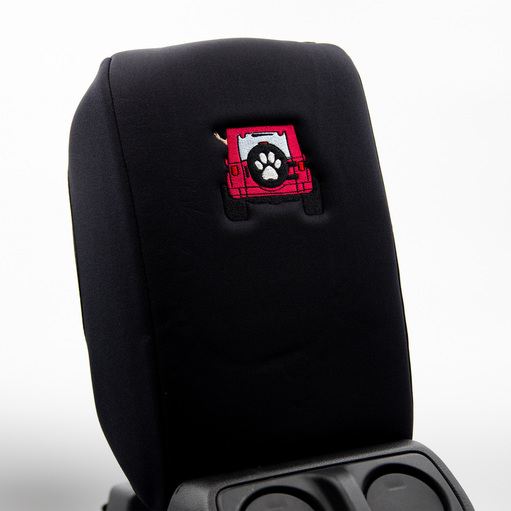 Black console cover with hot pink color-matched Jeep rear end and black tire cover with white paw print 