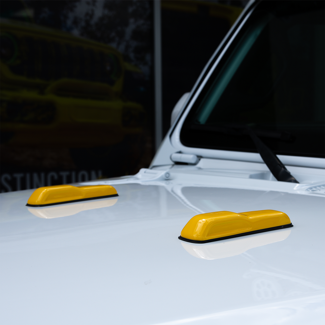 Nacho color cover'd up windshield bumper cover pair