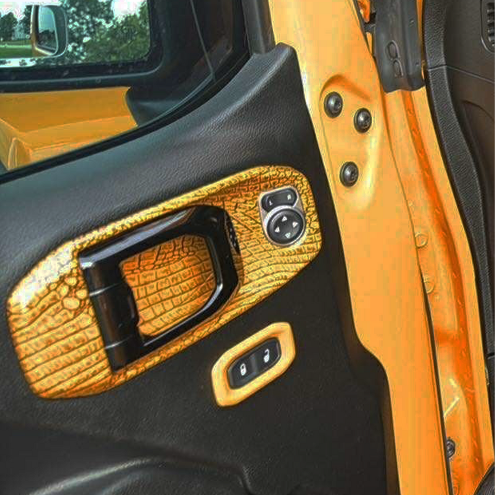 Close-up of Jeep JT interior door handle in Nacho color and gator pattern by Distinction Applied