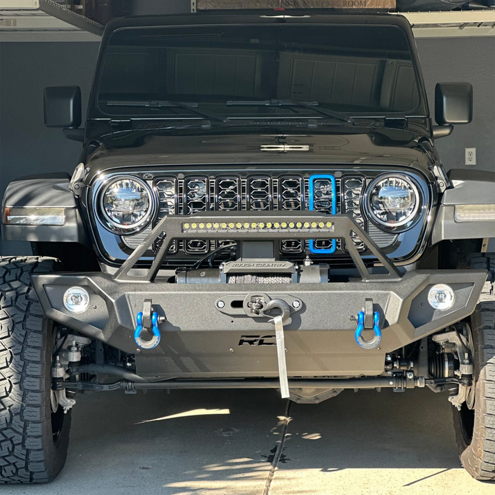Front view of a black Jeep with an aftermarket single trim slot in Hydro Blue with gloss finish