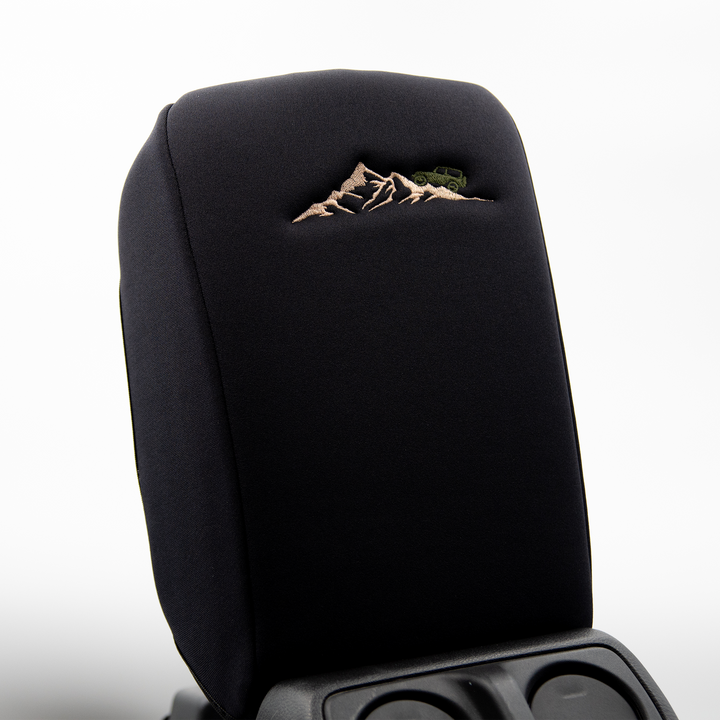 Black console cover with army green jeep on mountain 
