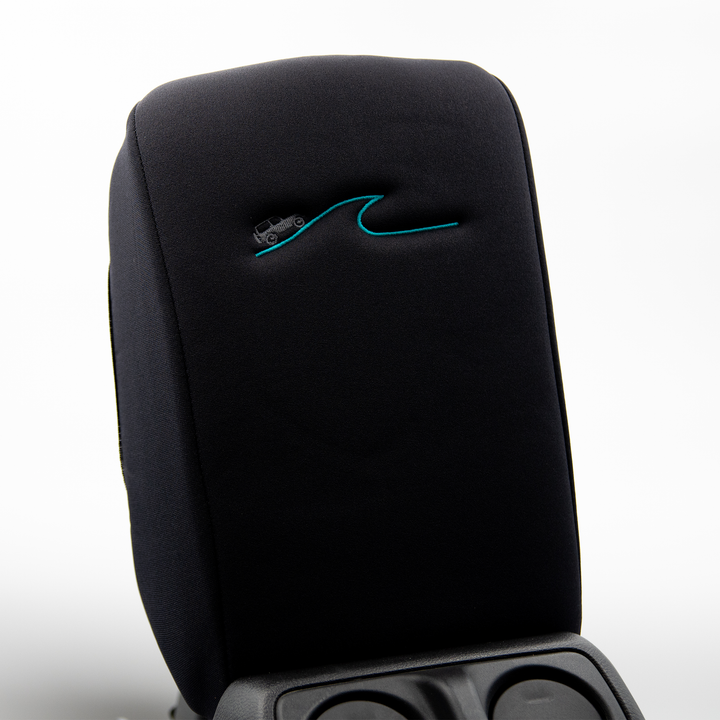 Black Armrest Cover with Gray Jeep driving a blue wave