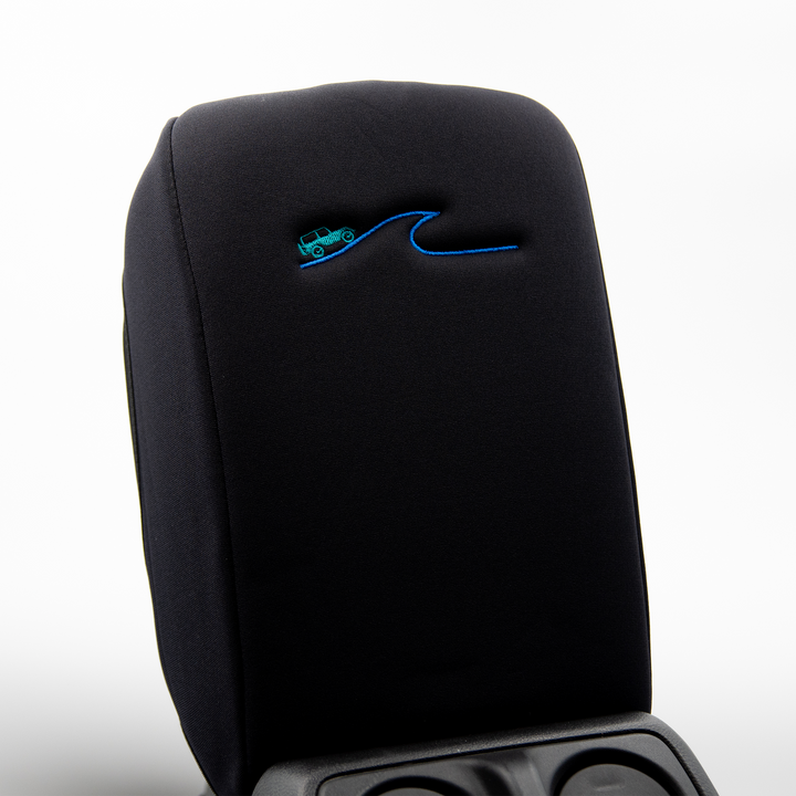 Black Armrest Cover with Teal Jeep driving a blue wave