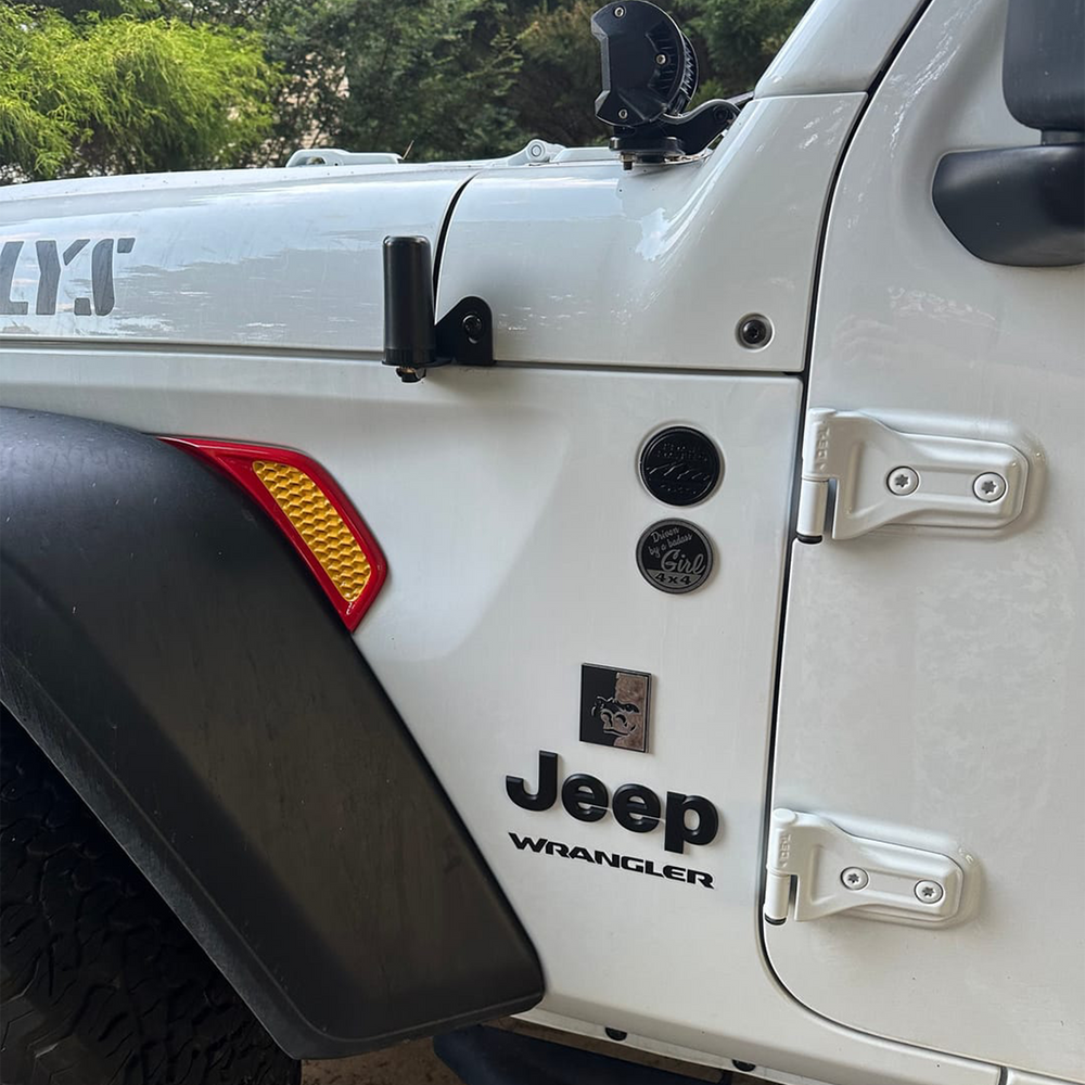 Two-tone fender vent OEM painted in Firecracker Red perimeter and Hella Yella Inset on white Whillys Jeep