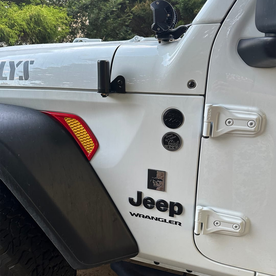 Two-tone fender vent OEM painted in Firecracker Red perimeter and Hella Yella Inset on white Whillys Jeep