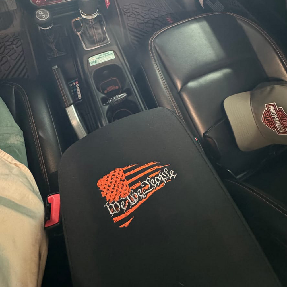 "We the People" orange thread console cover 